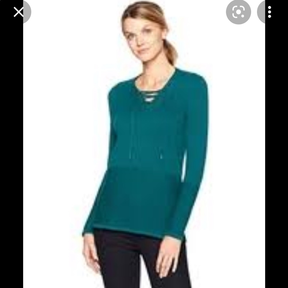 Tribal cross cross lagoon color sweater